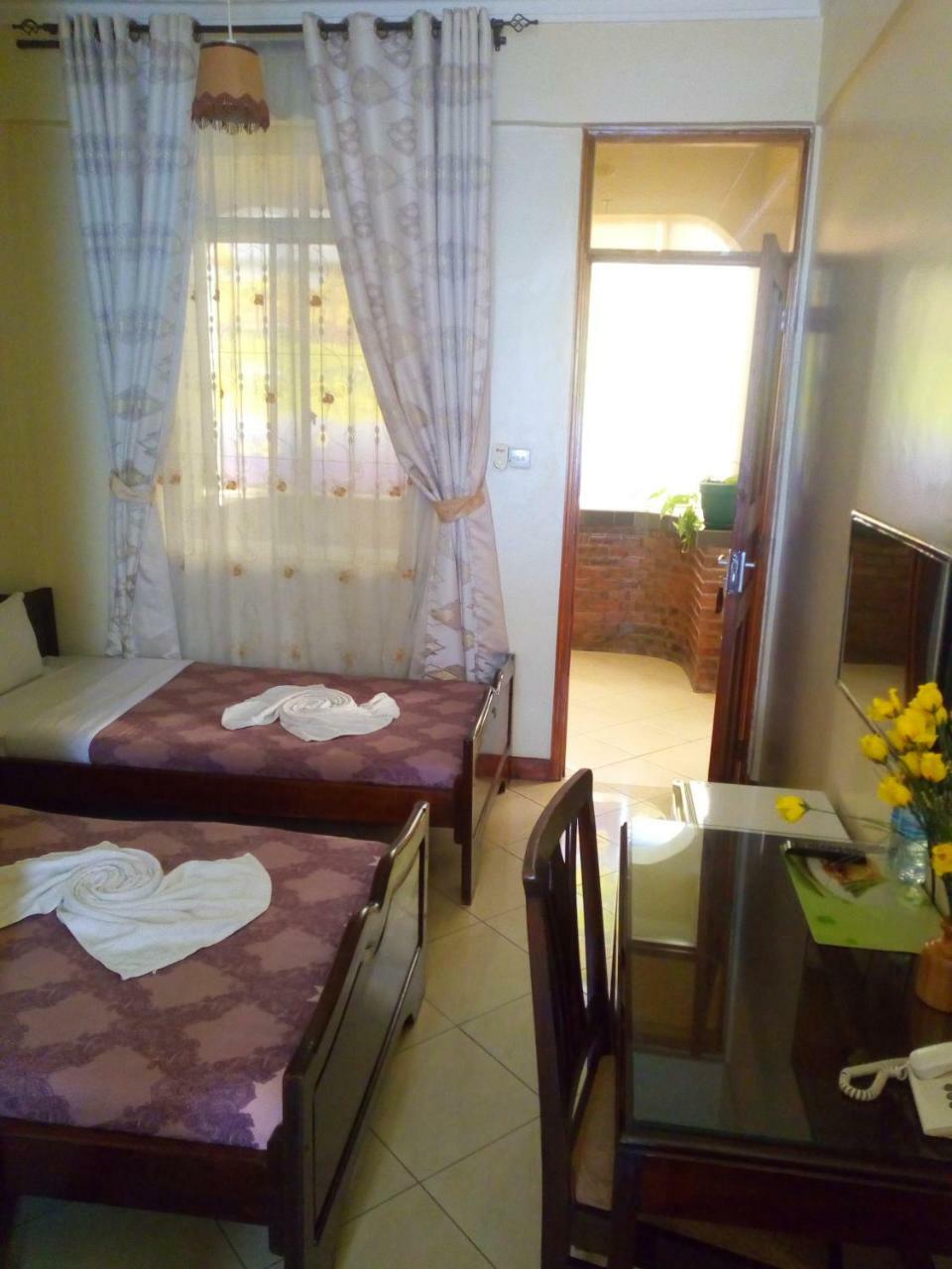 Snow View Hotel Boma la Ngombe Exteriör bild
